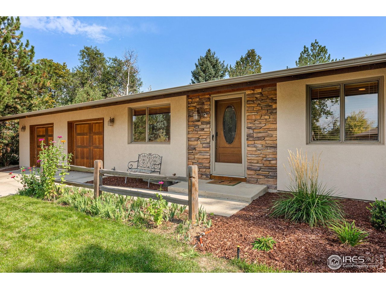5604 Bowron Place Longmont, CO 80503 - Photo 3 of 37 a view of a house with backyard and porch