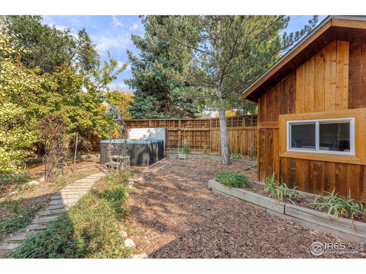 5604 Bowron Place Longmont, CO 80503 - Photo 35 of 37 a house view with a backyard space