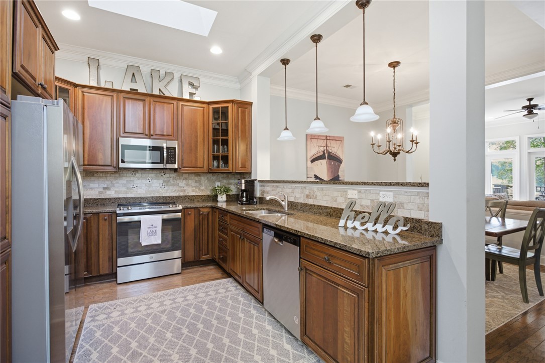 578 Sunset Point Drive West Union, SC 29696 - Photo 5 of 46 This thoughtfully designed kitchen offers both functionality and style.