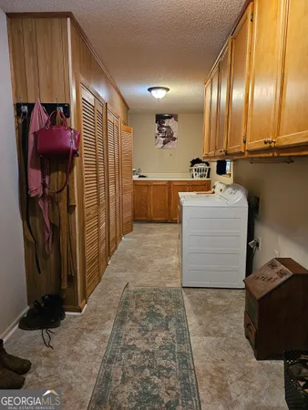 a view of a hallway with a couch