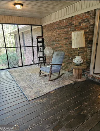 a view of porch with seating space