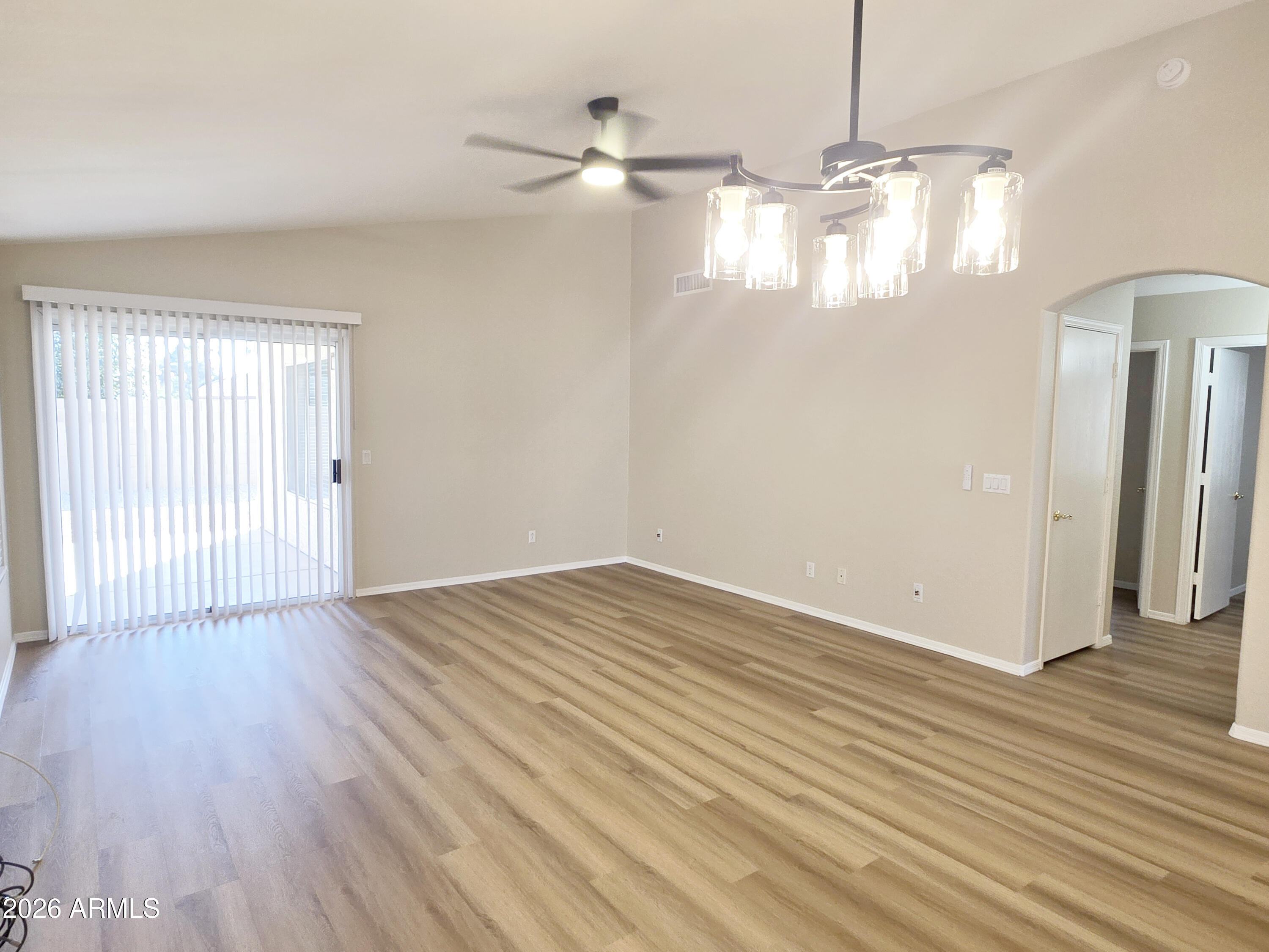 697 West Golden Street Gilbert, AZ 85233 - Photo 13 of 33 a view of empty room with wooden floor and fan
