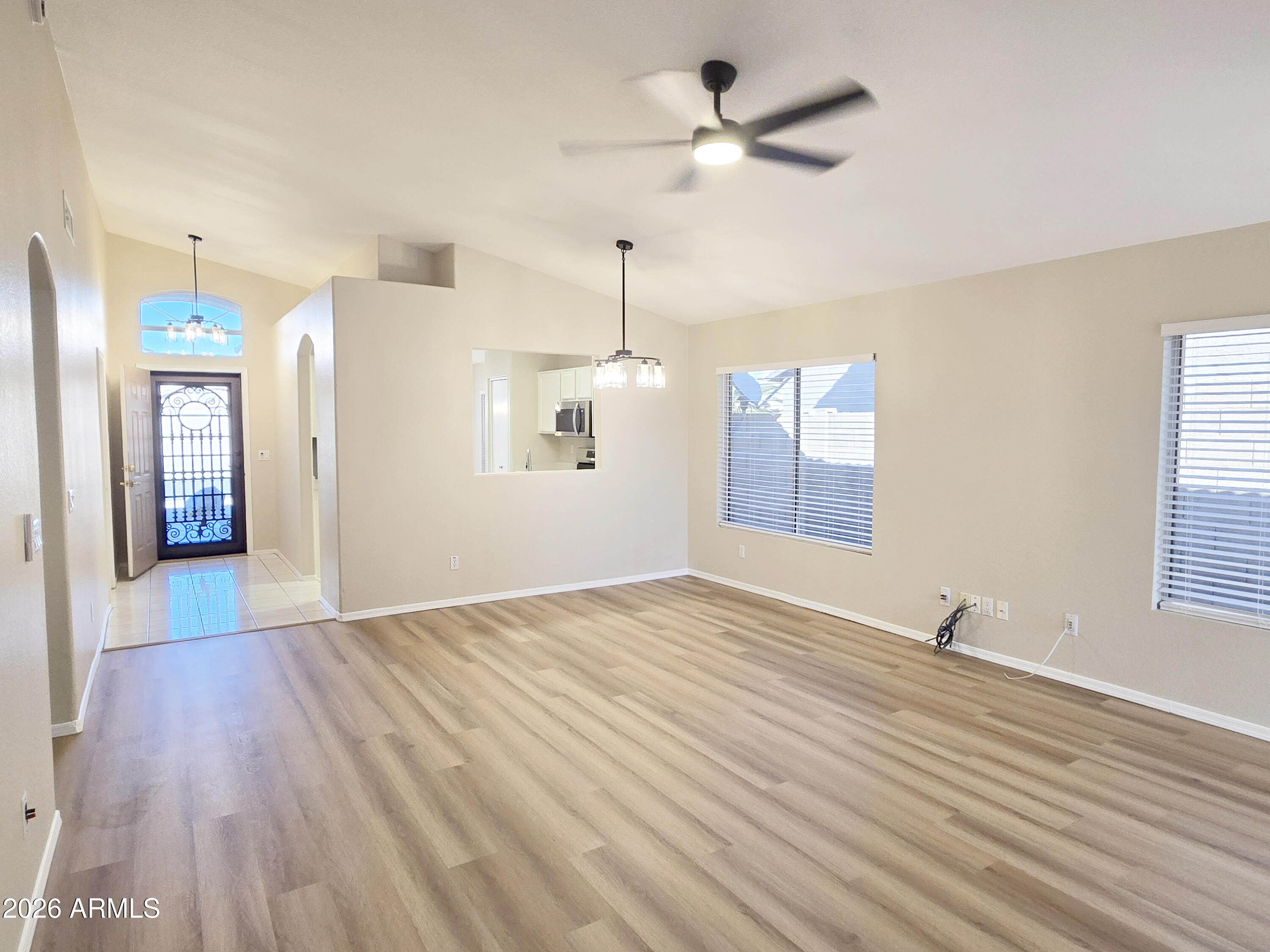 697 West Golden Street Gilbert, AZ 85233 - Photo 15 of 33 a view of empty room with wooden floor and fan