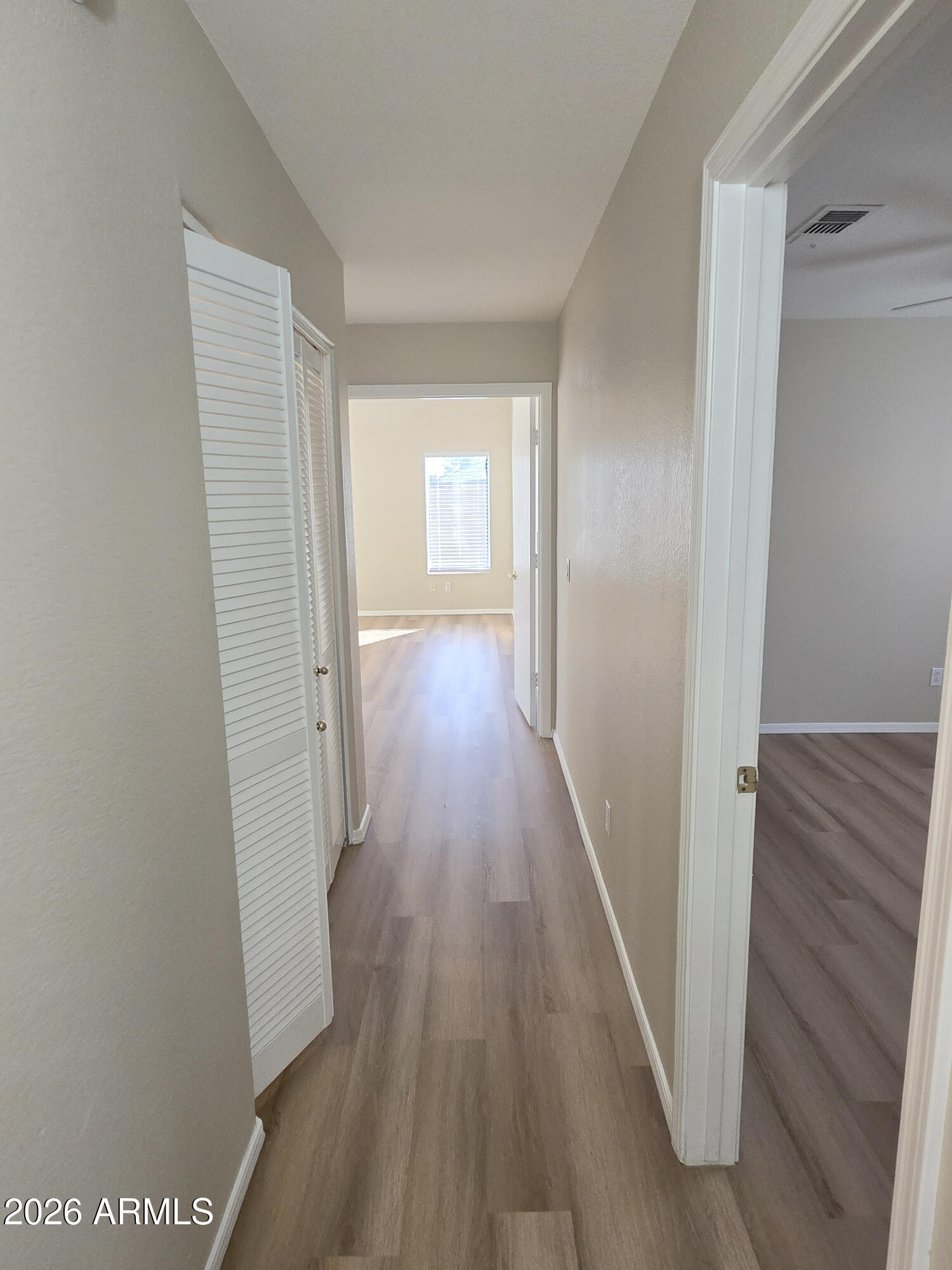 697 West Golden Street Gilbert, AZ 85233 - Photo 21 of 33 a view of a hallway with wooden floor