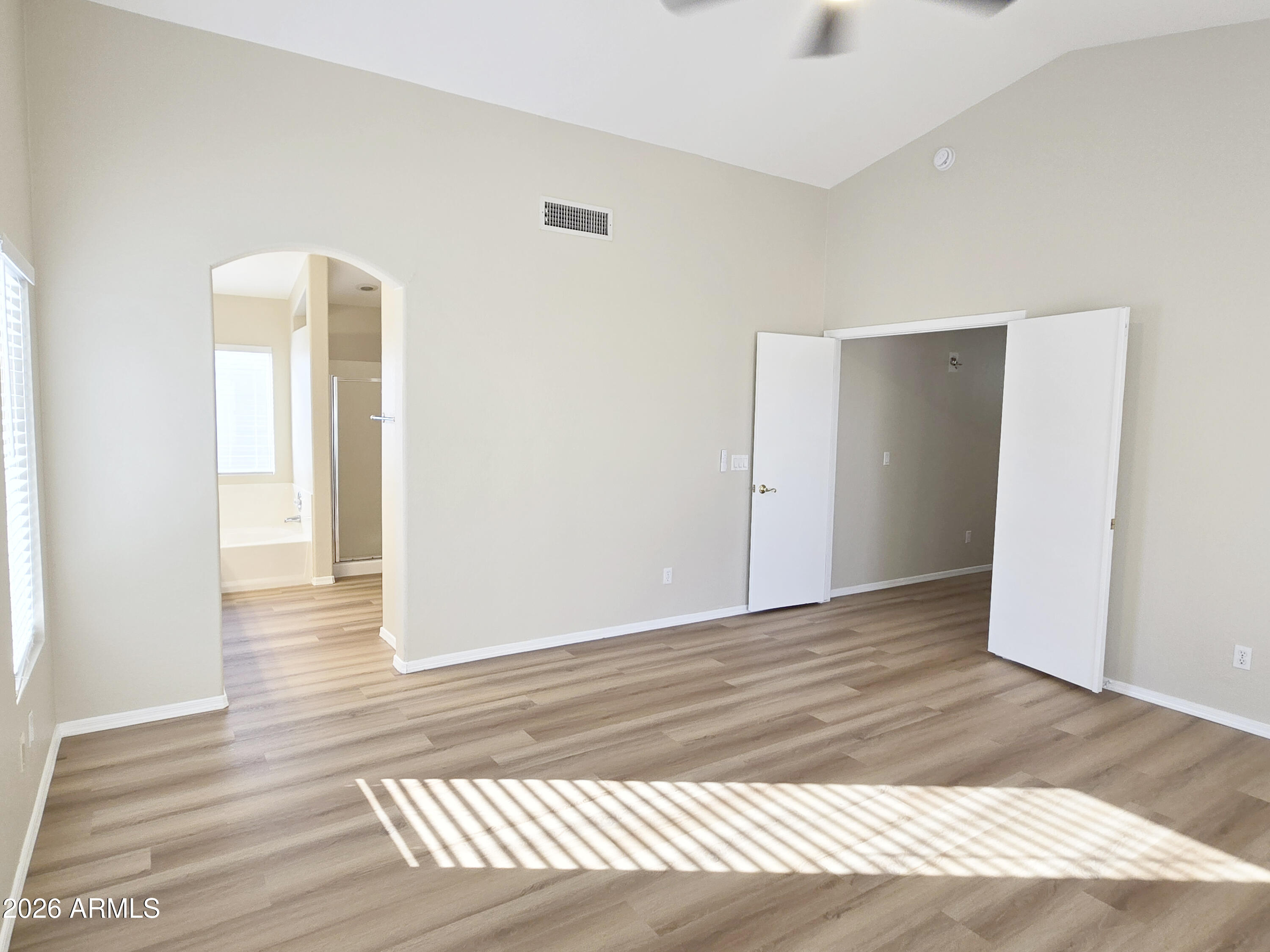697 West Golden Street Gilbert, AZ 85233 - Photo 26 of 33 a view of a room with wooden floor and bathroom