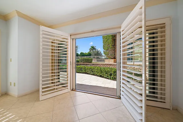 a view of empty room with windows