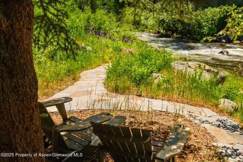 a view of yard with patio