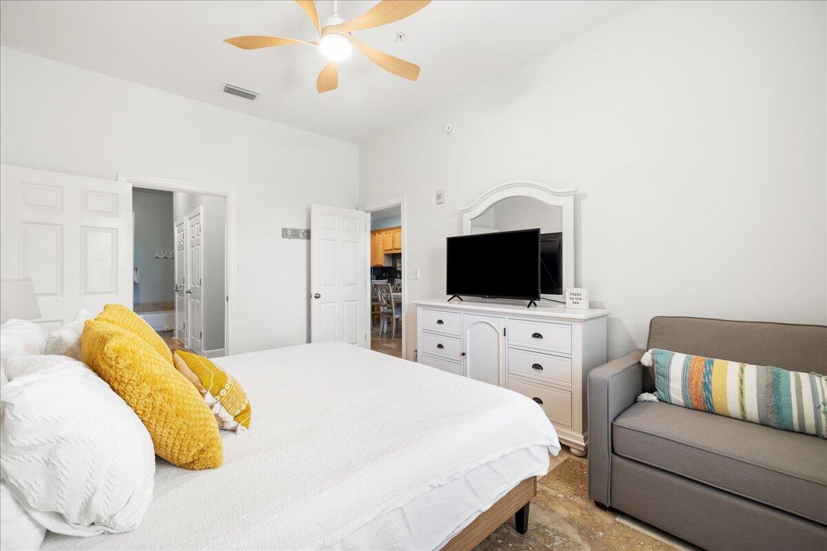 231 Somerset Bridge Road, Unit 1209 Santa Rosa Beach, FL 32459 - Photo 11 of 22 a bedroom with a bed and a flat screen tv