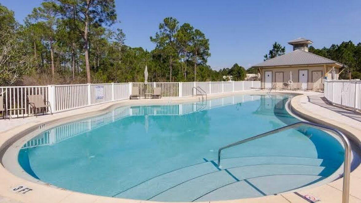 231 Somerset Bridge Road, Unit 1209 Santa Rosa Beach, FL 32459 - Photo 19 of 22 a view of a swimming pool with a patio