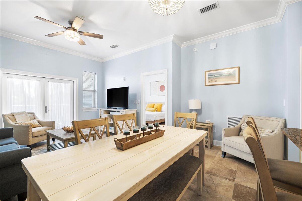 231 Somerset Bridge Road, Unit 1209 Santa Rosa Beach, FL 32459 - Photo 9 of 22 a living room with furniture and a flat screen tv