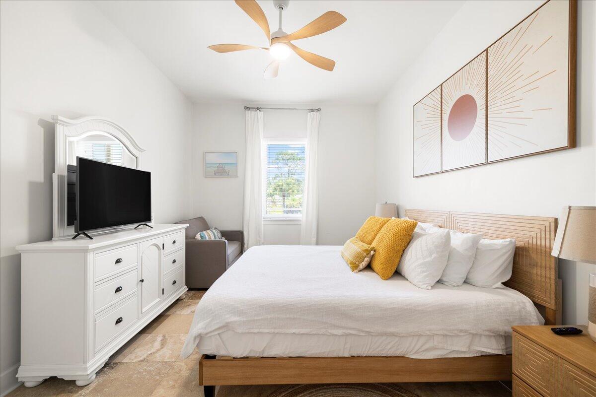 231 Somerset Bridge Road, Unit 1209 Santa Rosa Beach, FL 32459 - Photo 10 of 22 a bedroom with a bed and a flat screen tv