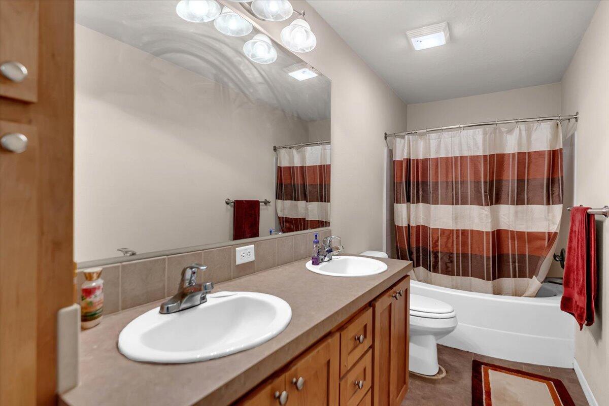 1827 West Ball Mountain Little Shasta Road Macdoel, CA 96058 - Photo 120 of 129 a bathroom with a sink and a mirror