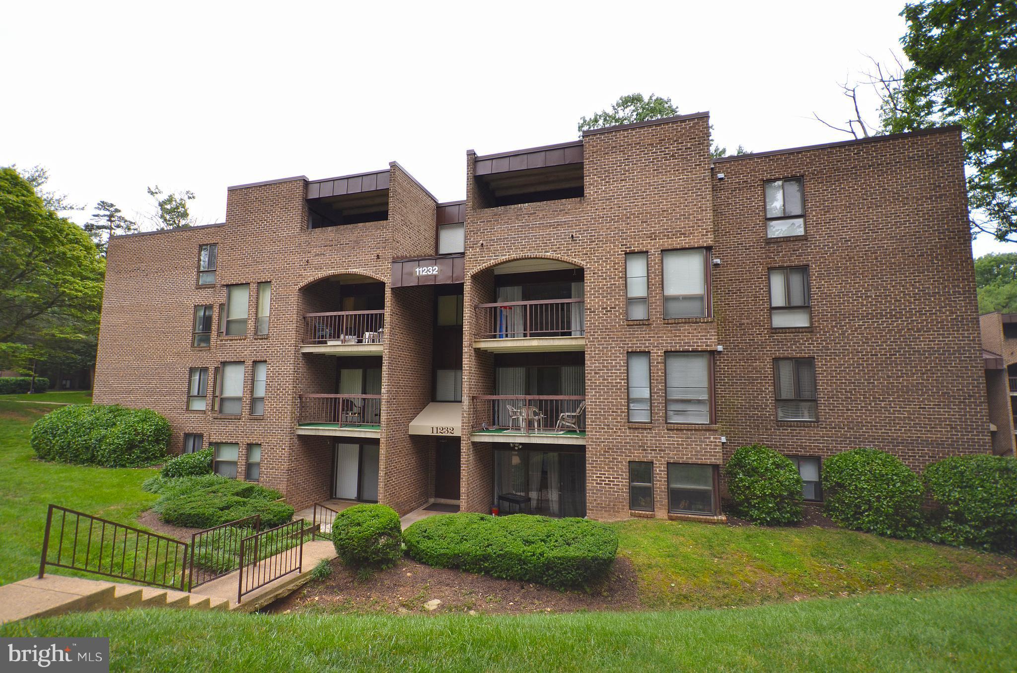 11232 Chestnut Grove Square, Unit 335 Reston, VA 20190 - Photo 1 of 27 Exterior (Rear)