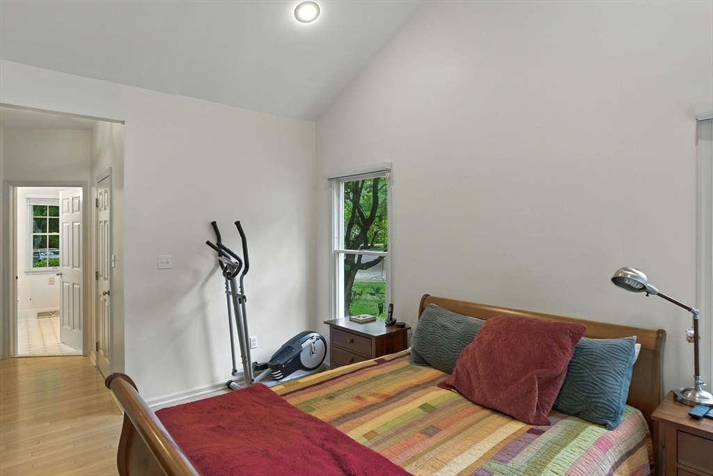 7 Alder Way, Unit 7 Bedford, MA 01730 - Photo 13 of 30 a bed room with a bed and a window