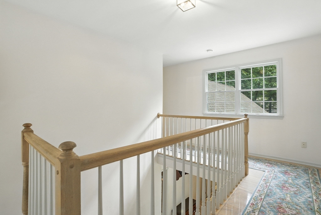 7 Alder Way, Unit 7 Bedford, MA 01730 - Photo 17 of 30 a view of staircase with rug