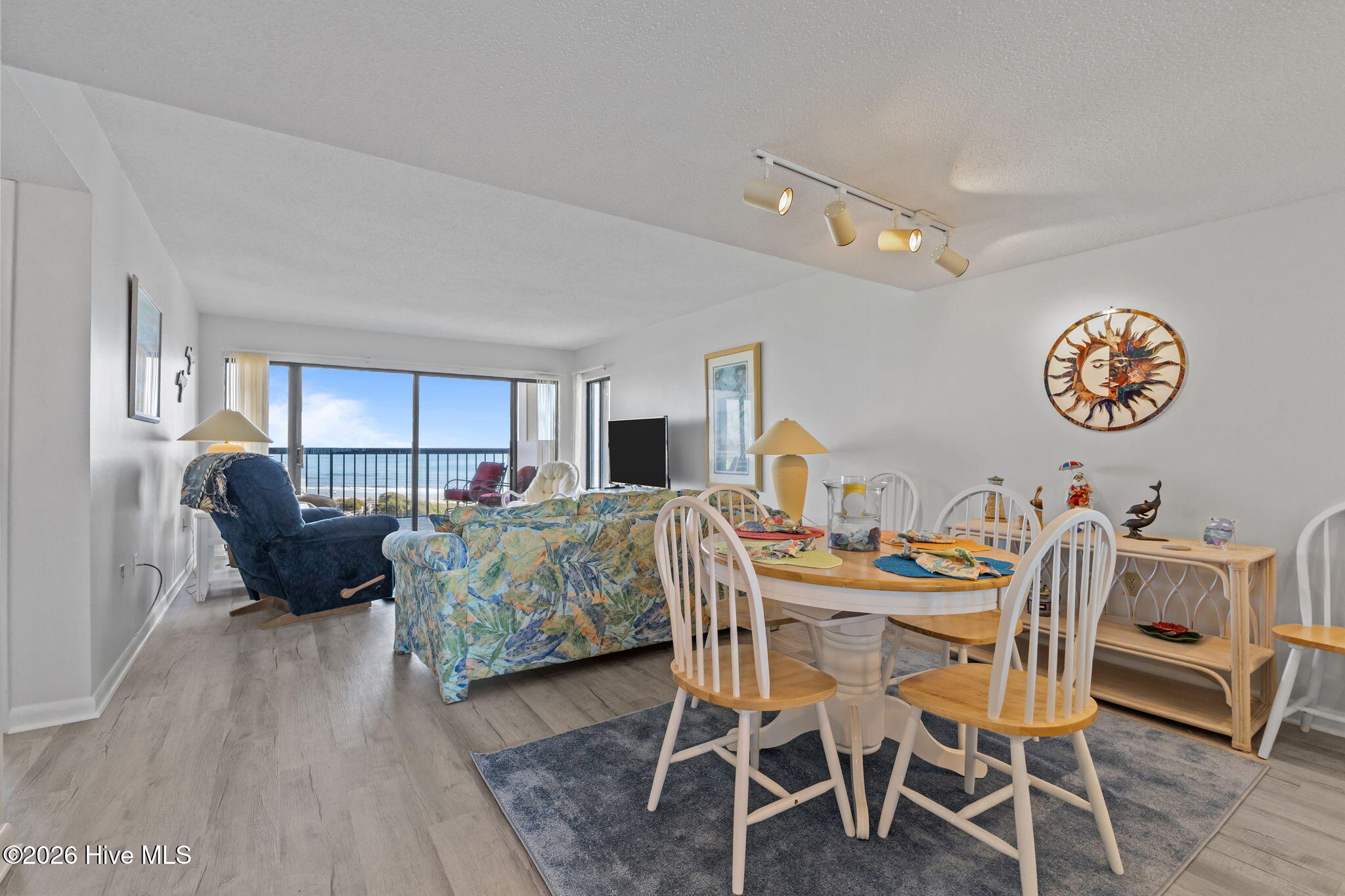8801 Reed Drive, Unit 314W Emerald Isle, NC 28594 - Photo 11 of 53 Dining & Living Areas Overlooking Ocean