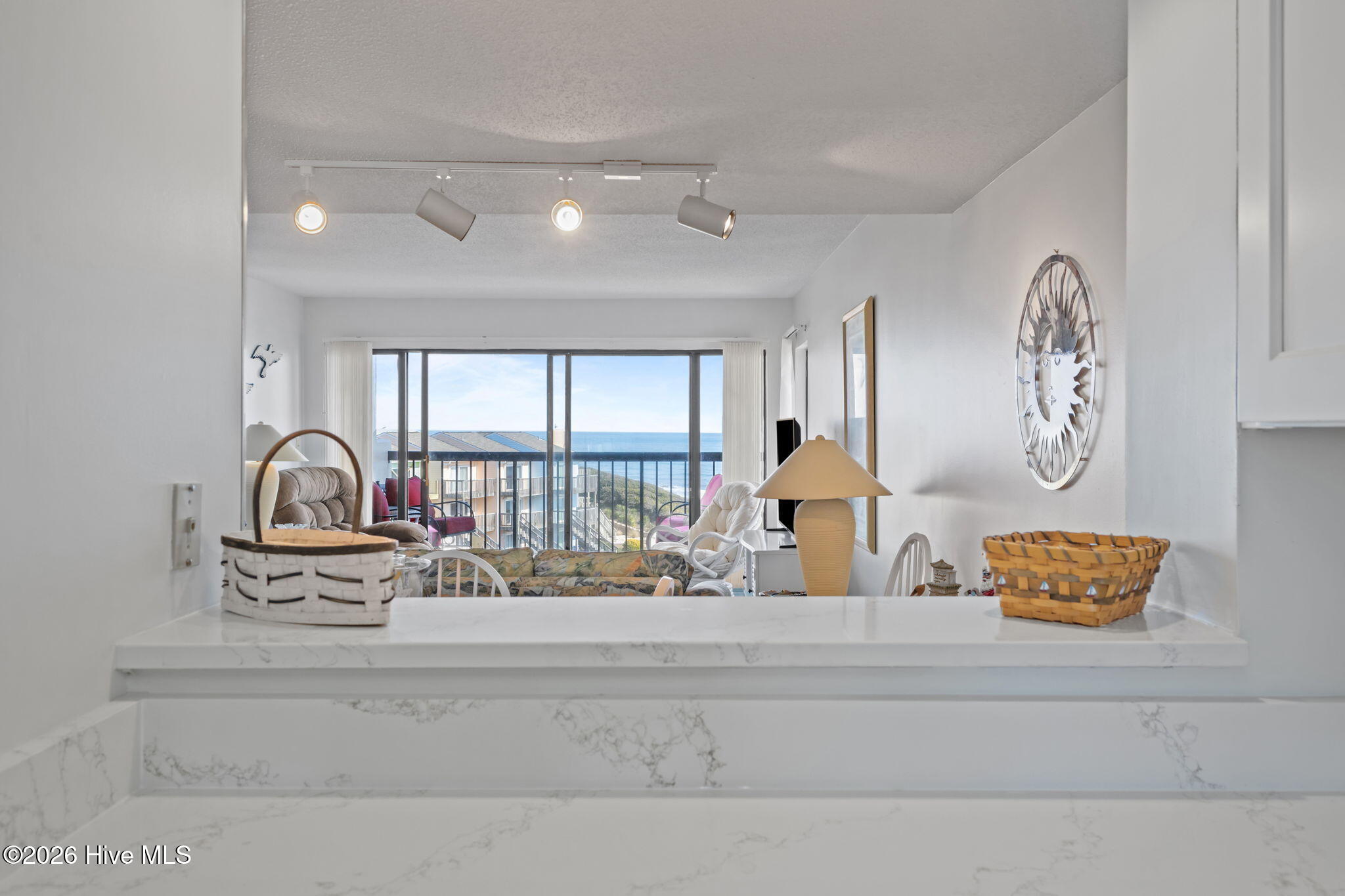 8801 Reed Drive, Unit 314W Emerald Isle, NC 28594 - Photo 15 of 53 Kitchen Bar Pass-Thru