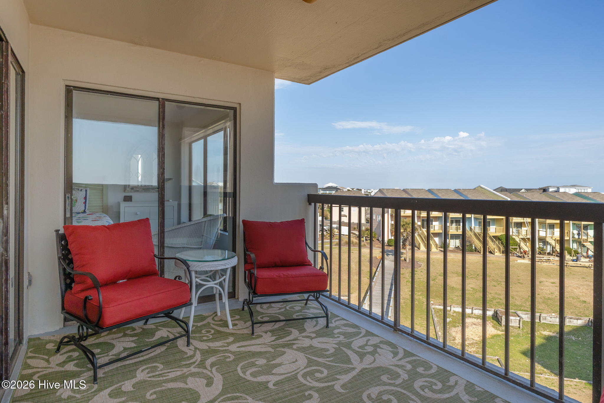 8801 Reed Drive, Unit 314W Emerald Isle, NC 28594 - Photo 5 of 53 Large Covered Balcony