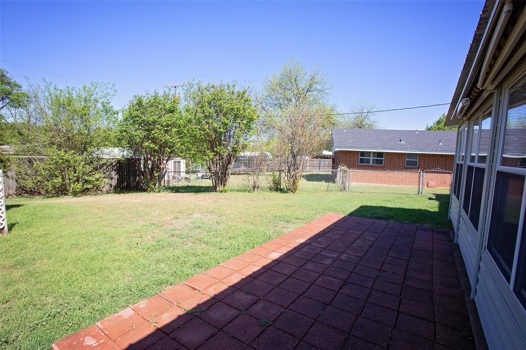 914 Fairview Street Graham, TX 76450 - Photo 15 of 17 a view of yard with green space