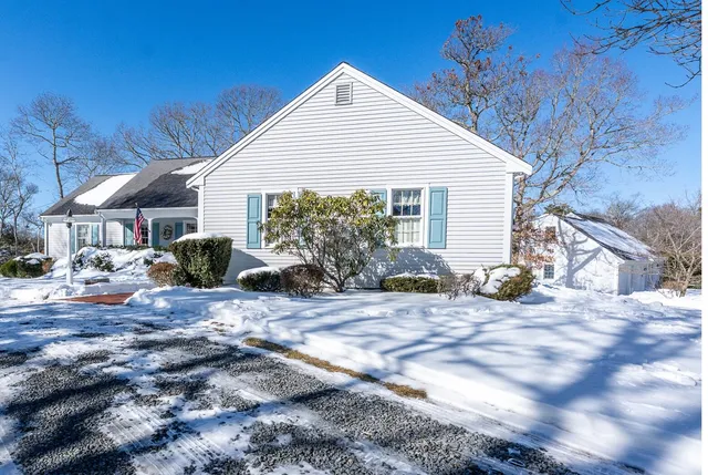 a view of a house with a patio