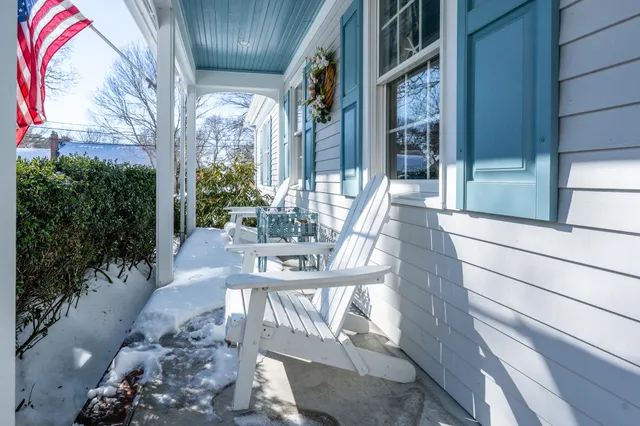 a view of balcony with furniture