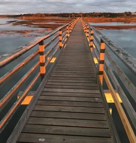 a balcony with an outdoor seating