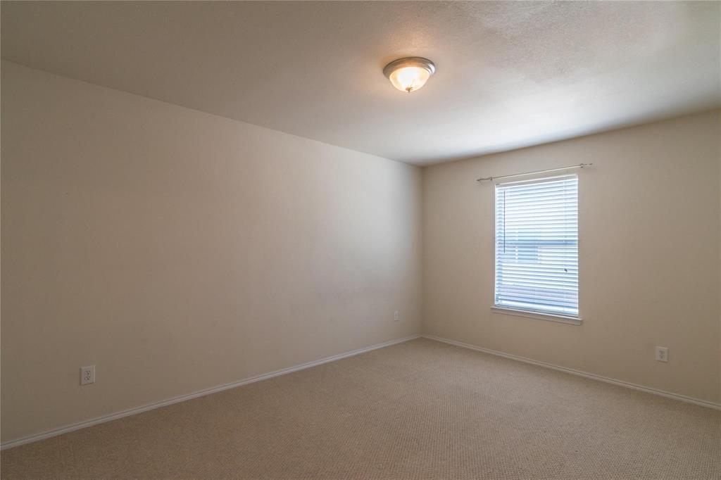 4074 Kyndra Circle Richardson, TX 75082 - Photo 13 of 27 an empty room with a window