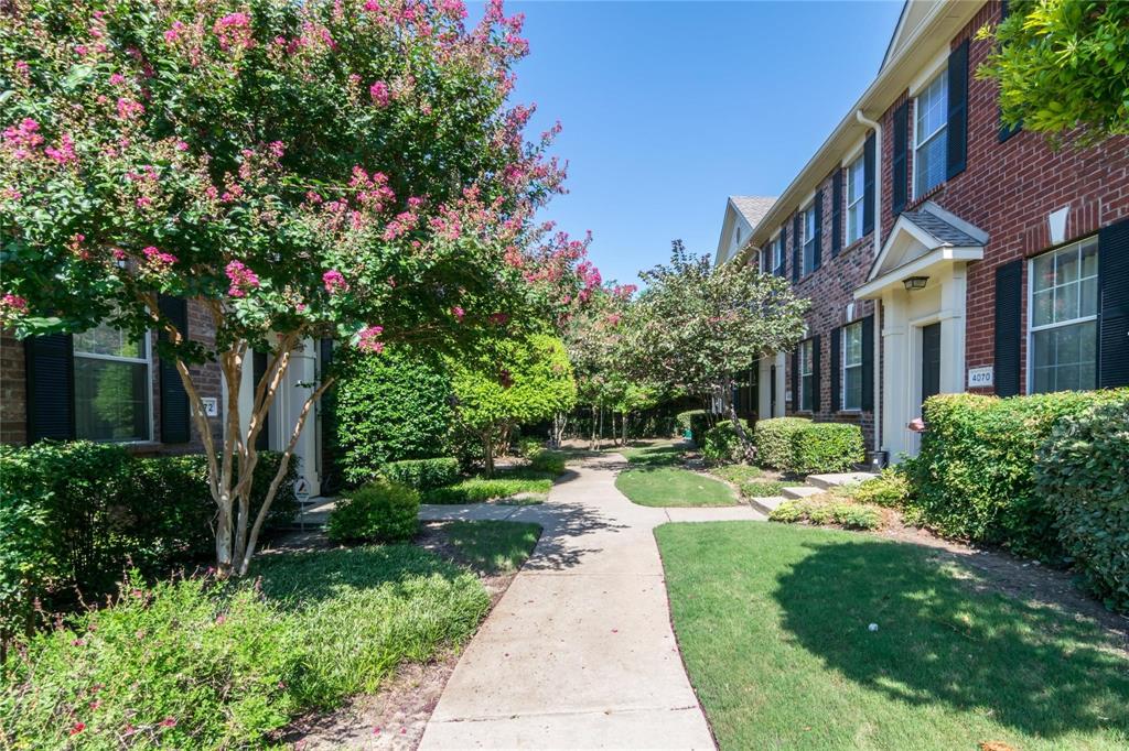 4074 Kyndra Circle Richardson, TX 75082 - Photo 2 of 27 a view of a yard in front of house