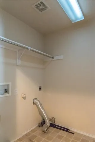 a view of a room with rack on the wall