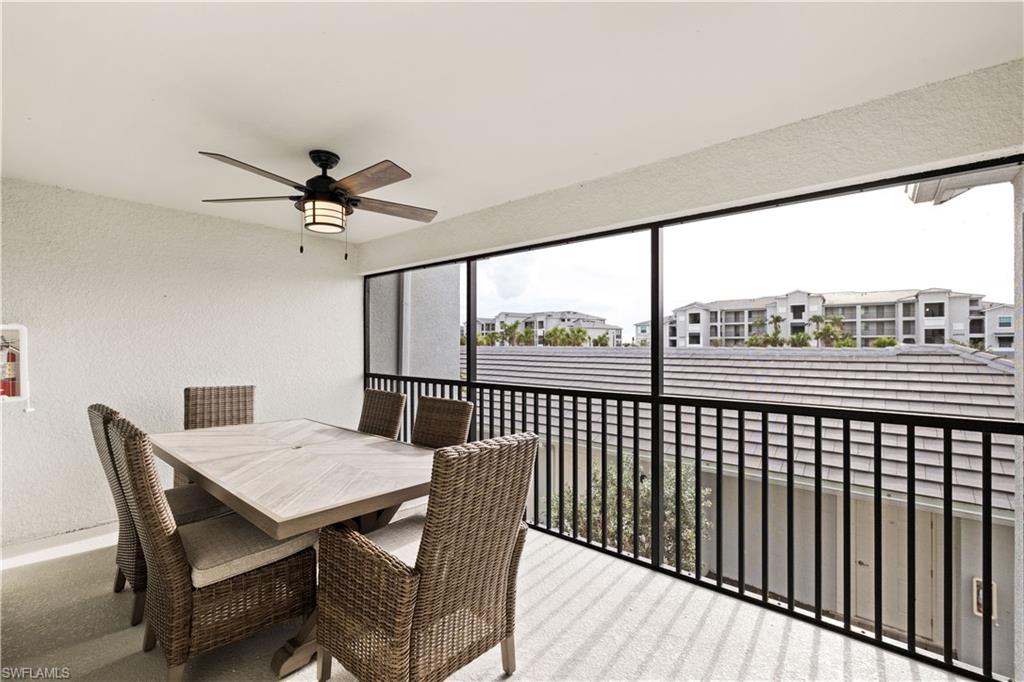 43041 Greenway Boulevard, Unit 921 Babcock Ranch, FL 33982 - Photo 14 of 15 a view of a dining room with furniture window and wooden floor