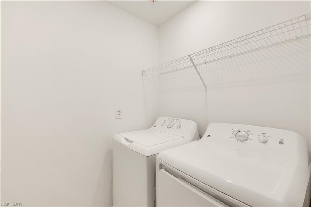 43041 Greenway Boulevard, Unit 921 Babcock Ranch, FL 33982 - Photo 15 of 15 a utility room with dryer and washer