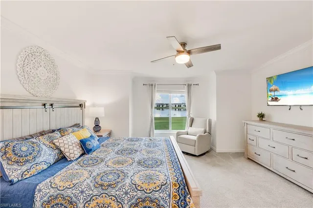 a bedroom with furniture and window