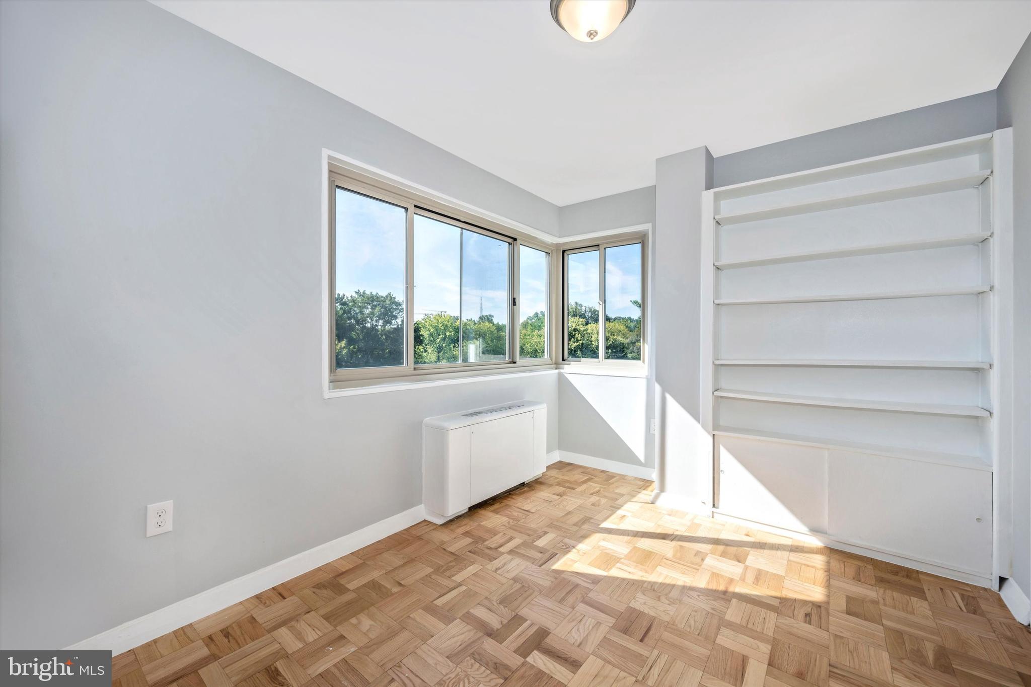 4600 Connecticut Avenue Northwest, Unit 810 Washington, DC 20008 - Photo 24 of 44 Third bedroom with built in book case