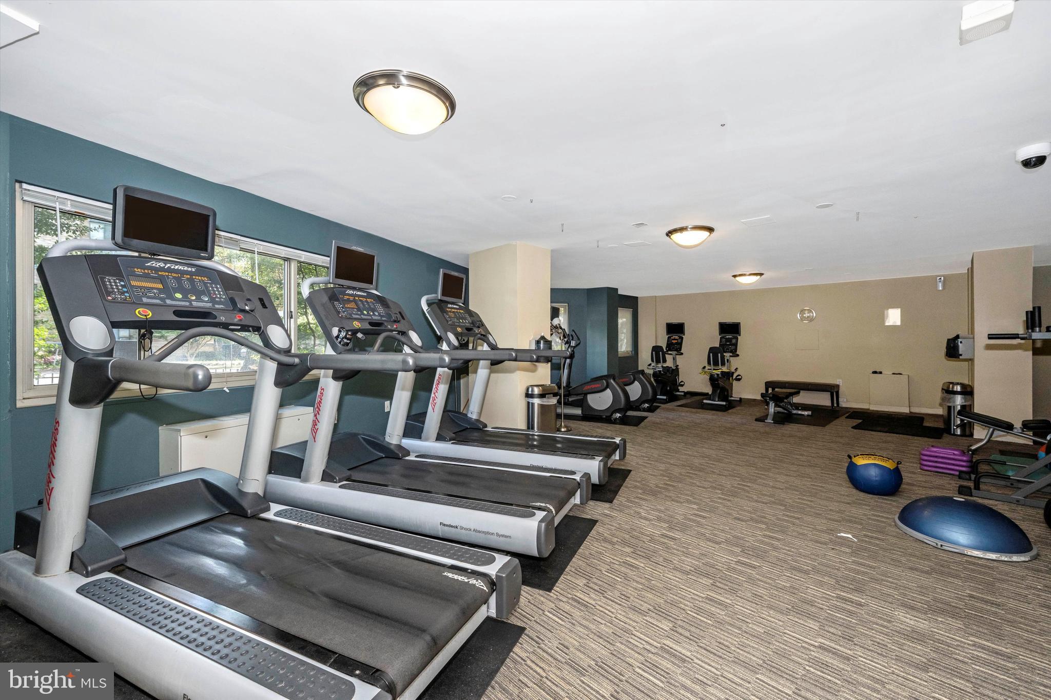 4600 Connecticut Avenue Northwest, Unit 810 Washington, DC 20008 - Photo 28 of 44 Fitness room with many workout machines