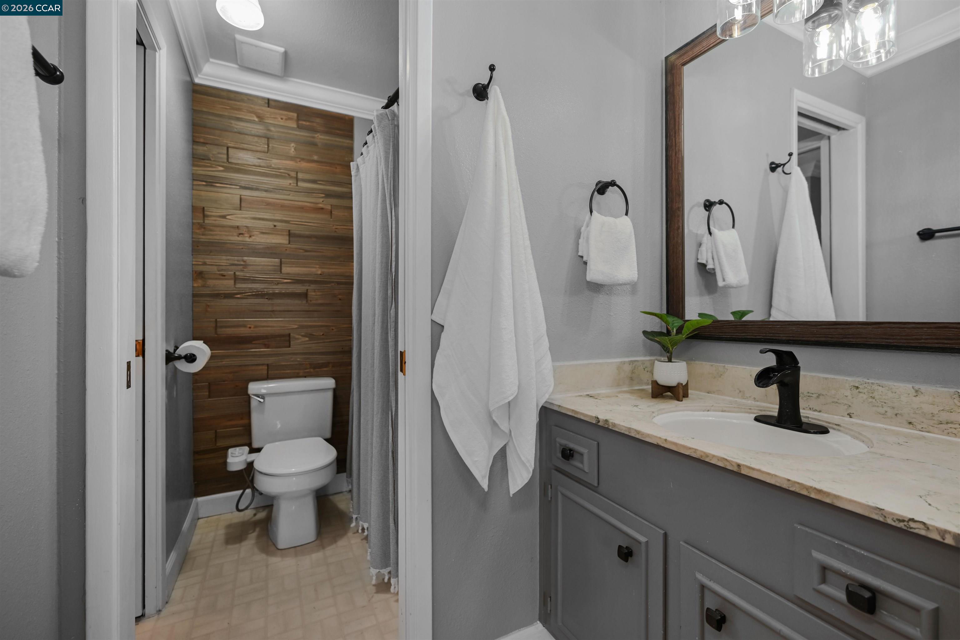 825 Oak Grove Road, Unit 46 Concord, CA 94518 - Photo 23 of 32 a bathroom with a sink a toilet and shower