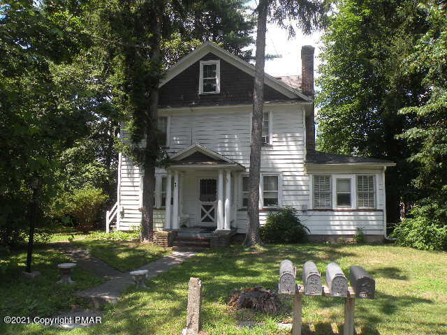 169 Tanite Road Stroudsburg, PA 18360 - Photo 22 of 22 front view of a house with a yard