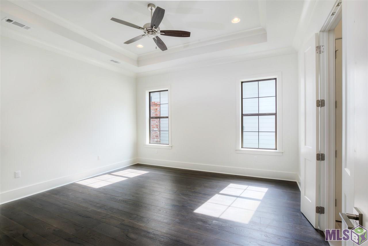 10624 Preservation Way Baton Rouge, LA 70810 - Photo 12 of 23 Master bedroom with wood flooring