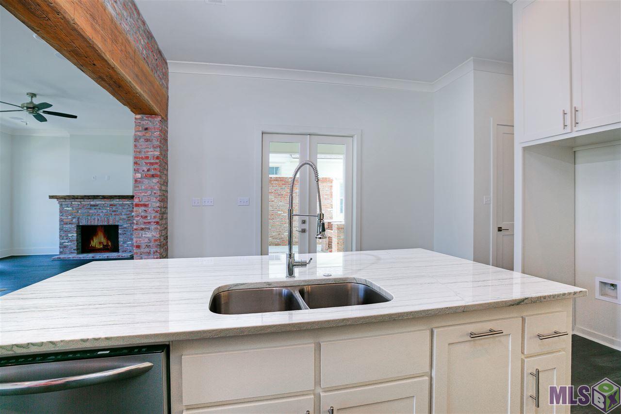 10624 Preservation Way Baton Rouge, LA 70810 - Photo 21 of 23 Looking into the courtyard area from the kitchen