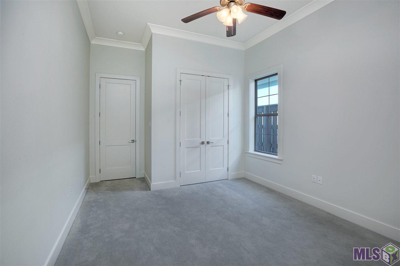 10624 Preservation Way Baton Rouge, LA 70810 - Photo 8 of 23 Generously sized guest bedroom