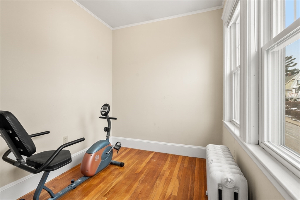 4 Albano Street, Unit 2 Boston, MA 02131 - Photo 18 of 24 a view of a workspace with furniture and a window