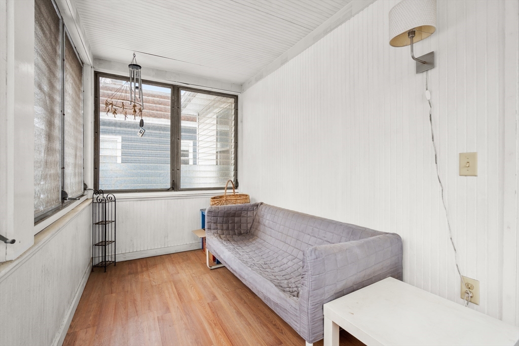 4 Albano Street, Unit 2 Boston, MA 02131 - Photo 21 of 24 a living room with furniture and a large window