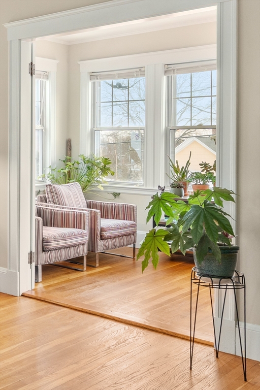 4 Albano Street, Unit 2 Boston, MA 02131 - Photo 8 of 24 a room with a table and a chair