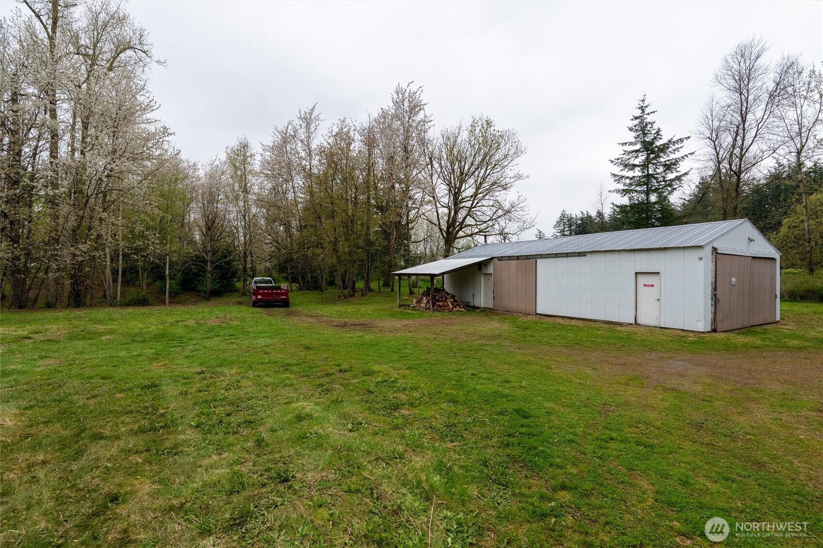 1822 East Pole Road Everson, WA 98247 - Photo 4 of 20 a view of a house with a backyard