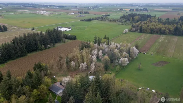 a view of a lake with a yard