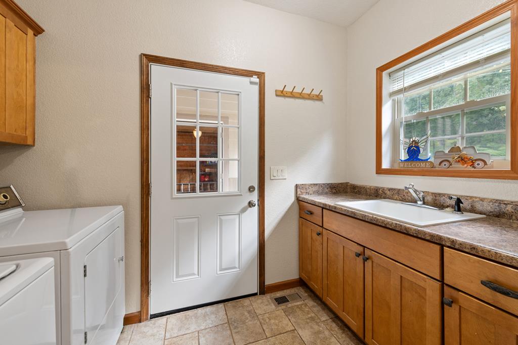 516 Crawford Road Blairsville, GA 30512 - Photo 15 of 49 a view of a sink and a mirror