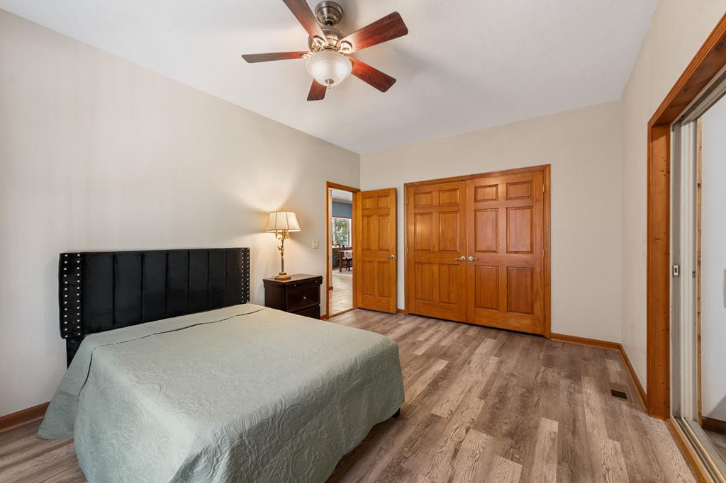 516 Crawford Road Blairsville, GA 30512 - Photo 28 of 49 a bed room with a bed and a ceiling fan