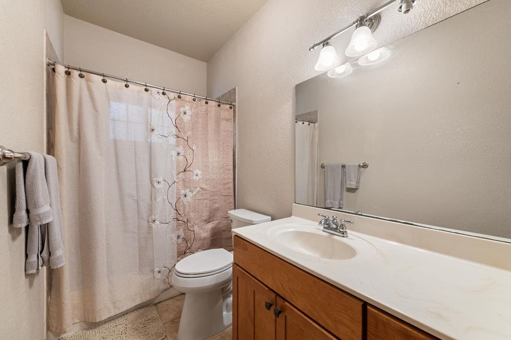 516 Crawford Road Blairsville, GA 30512 - Photo 35 of 49 a bathroom with a sink toilet and shower