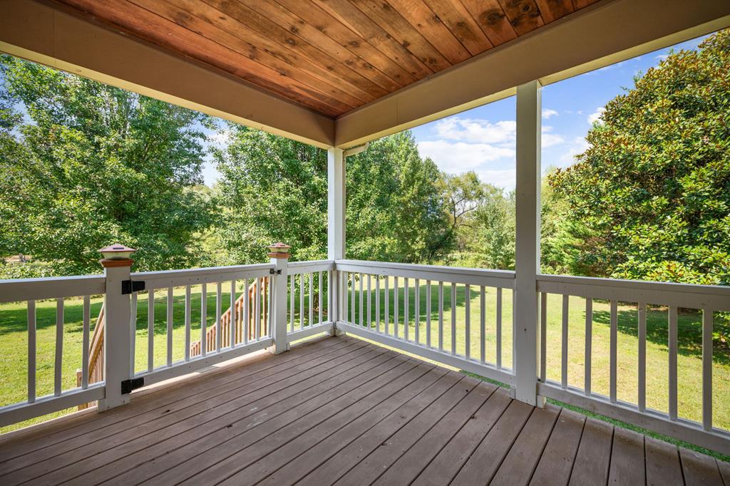 516 Crawford Road Blairsville, GA 30512 - Photo 37 of 49 a view of a balcony with wooden floor