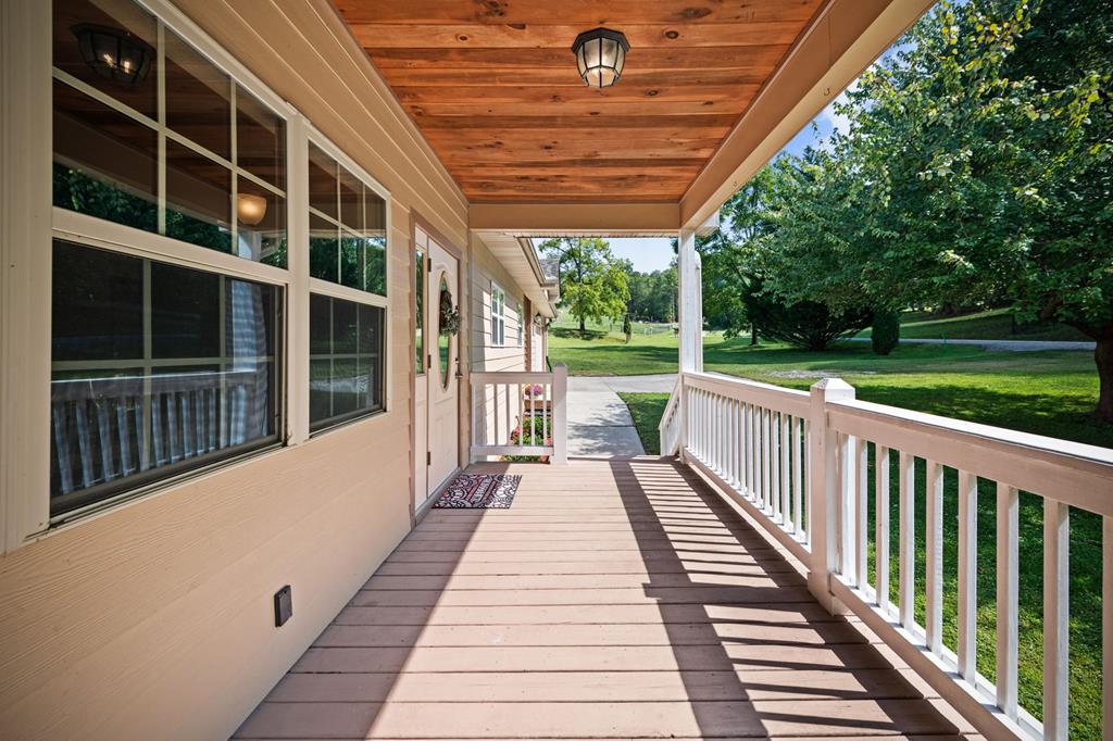 516 Crawford Road Blairsville, GA 30512 - Photo 40 of 49 a view of a balcony with wooden floor