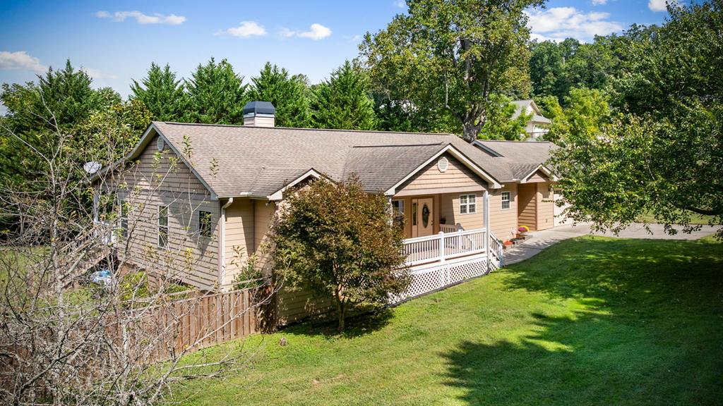 516 Crawford Road Blairsville, GA 30512 - Photo 4 of 49 a view of house with garden and trees